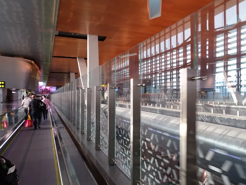 The walkway to the arrivals hall at Hamad International Airport, Doha