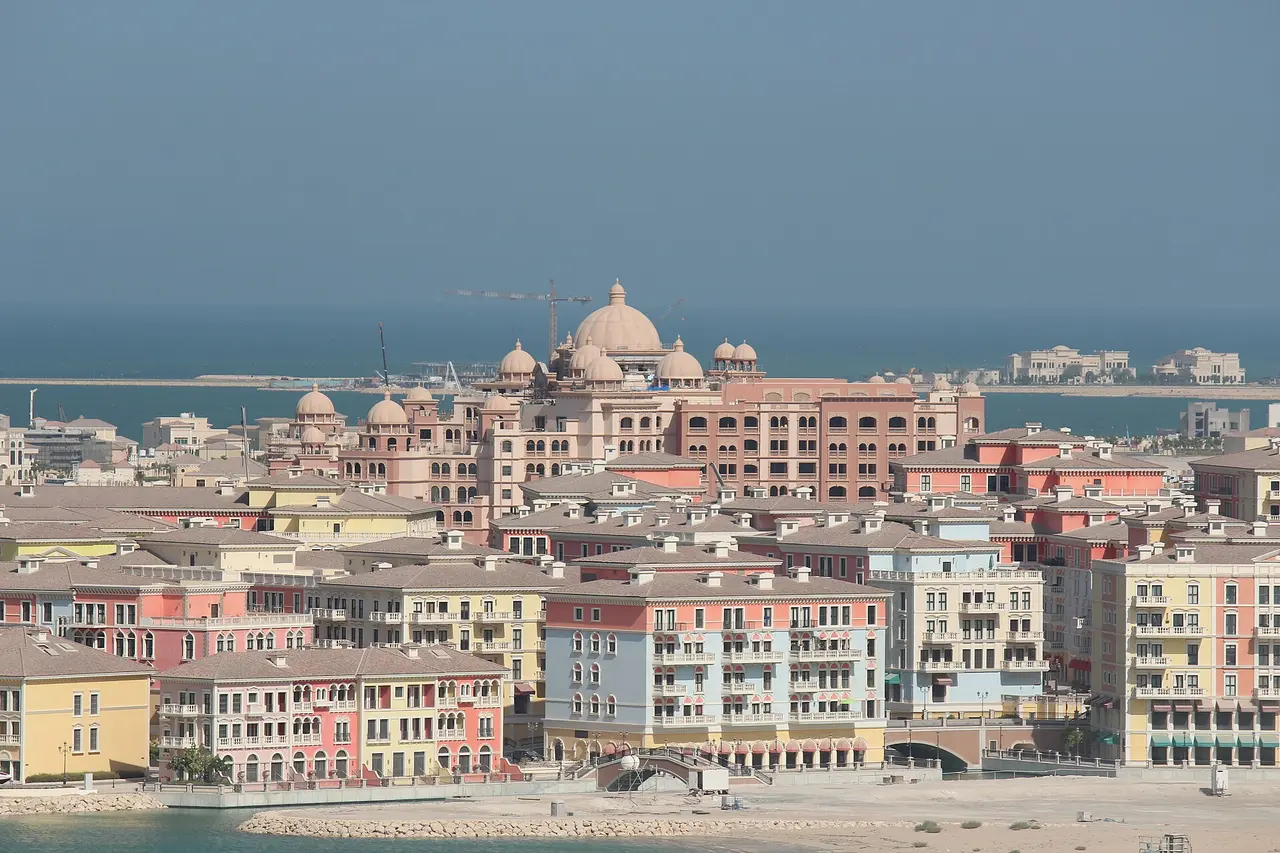 Pastel apartment buildings of Qanat Quartier at The Pearl, Doha