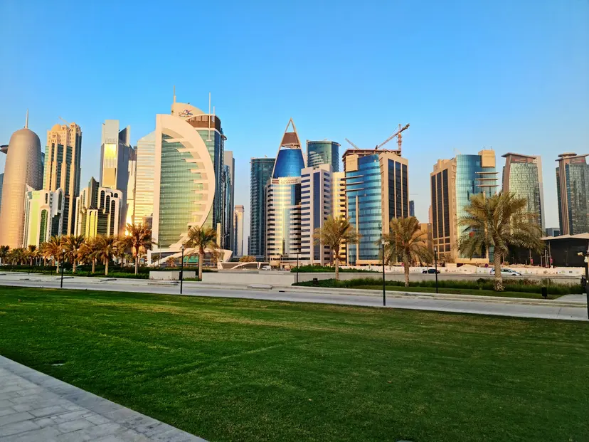 Doha West Bay towers seen across a park on a clear day