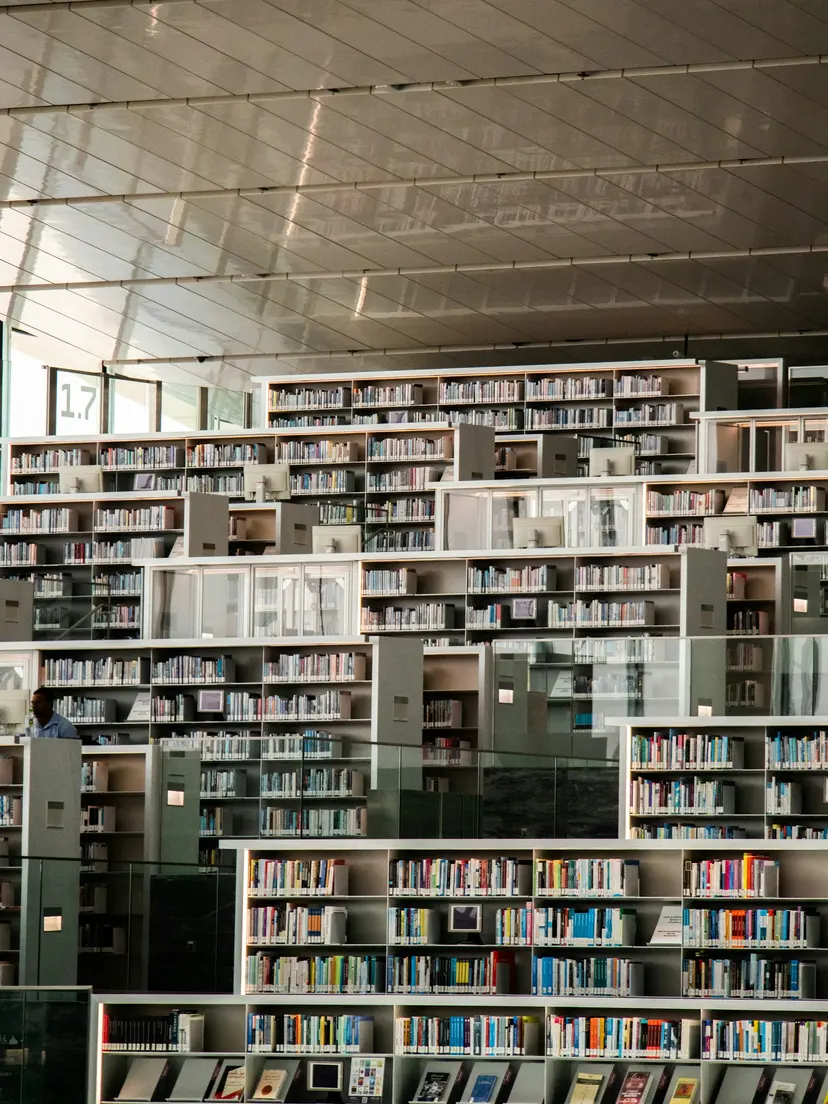 Rows of bookshelves inside the Qatar National Library